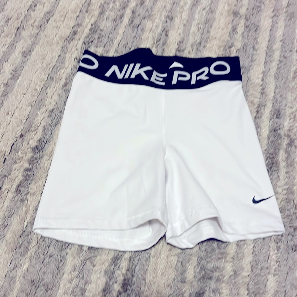 Nike Pro white athletic shorts, size S.